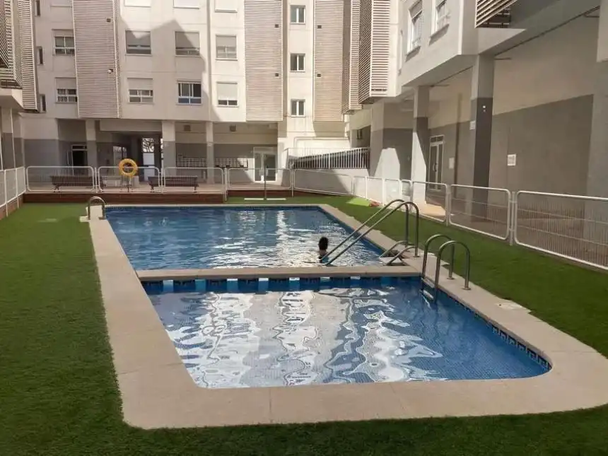 Swimming pool of Flat for sale in Alicante / Alacant  with Air Conditioner, Parquet flooring and Terrace