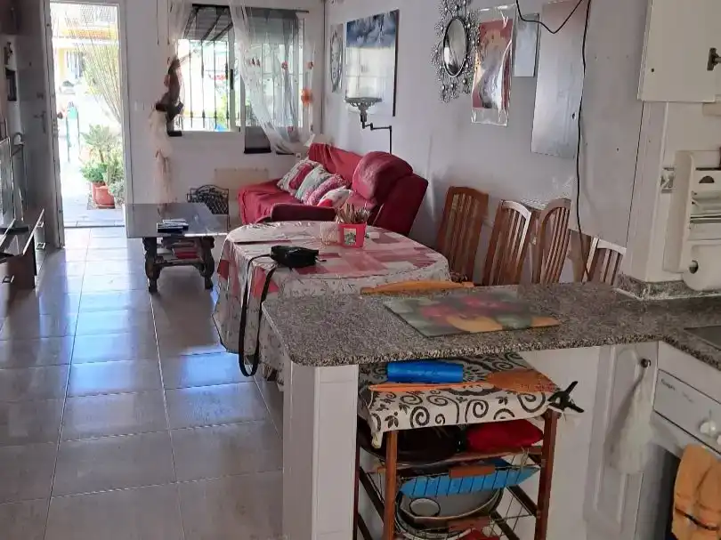 Sala d'estar de Pis en venda en Pilar de la Horadada amb Aire condicionat i Piscina