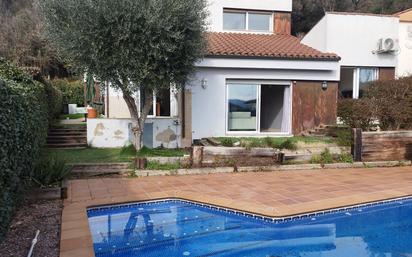 Swimming pool of House or chalet for sale in Medinyà  with Air Conditioner, Heating and Private garden