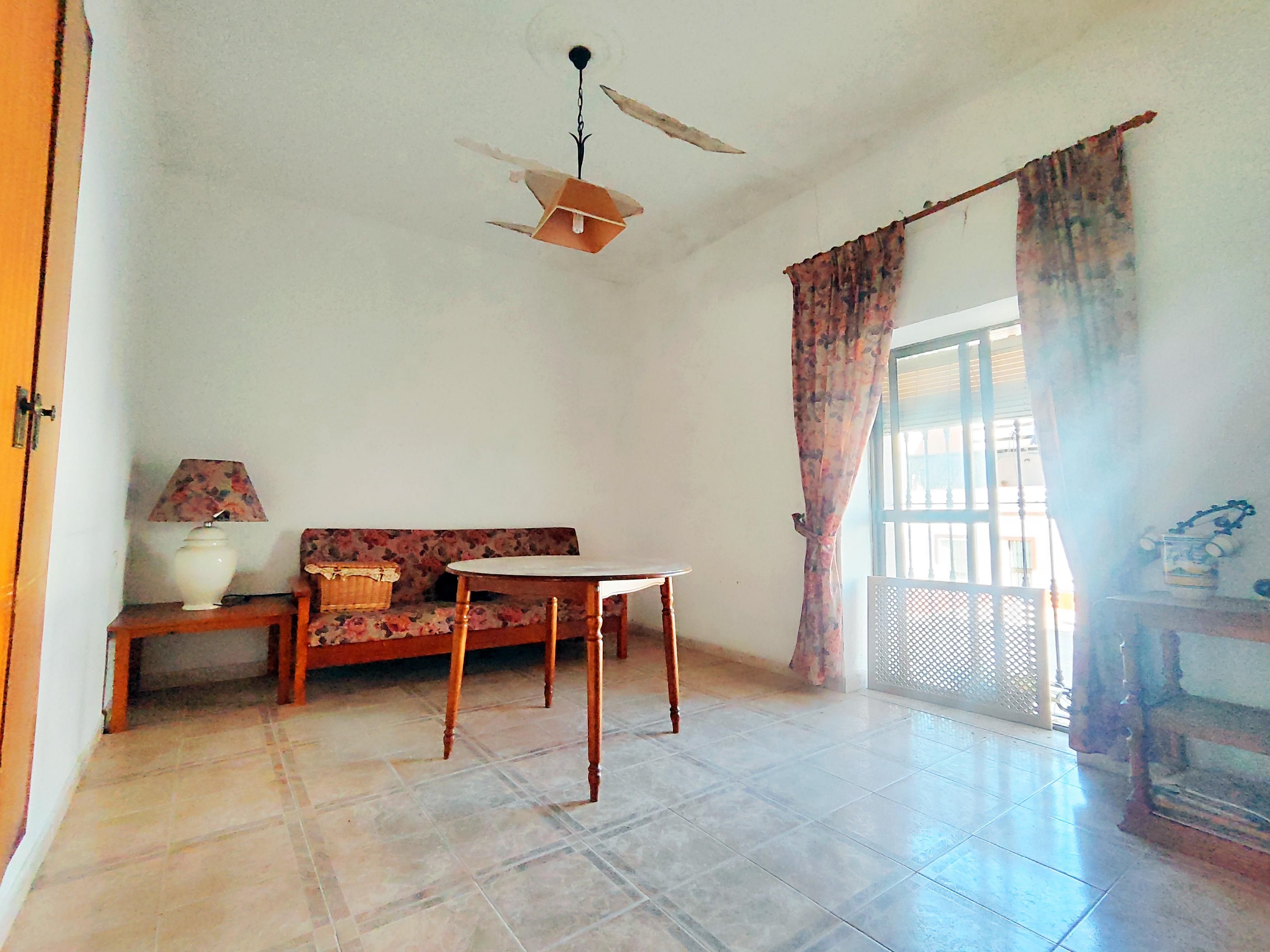 Sala d'estar de Casa adosada en venda en Ayamonte amb Terrassa