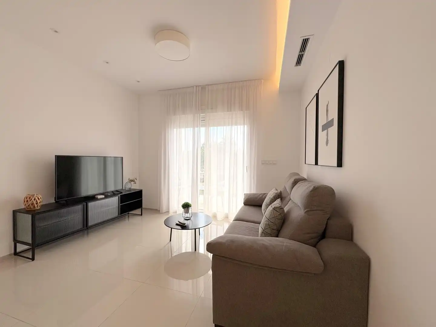 Sala d'estar de Apartament en venda en Rojales amb Aire condicionat, Calefacció i Jardí privat