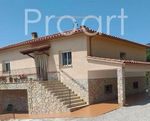 Exterior view of House or chalet for sale in Sant Feliu de Buixalleu  with Air Conditioner, Private garden and Storage room