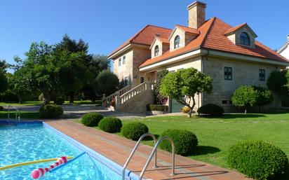 Piscina de Casa o xalet en venda en Teo amb Terrassa i Piscina