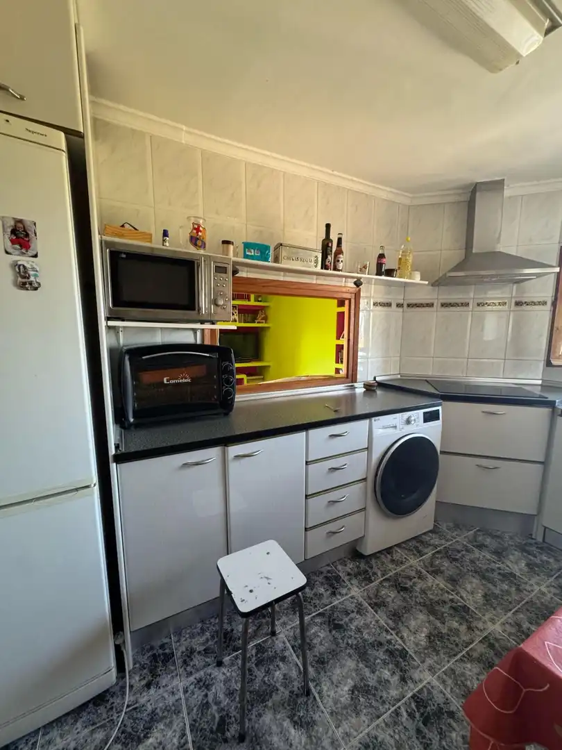 Cuina de Casa adosada en venda en Alcañiz amb Terrassa, Traster i Piscina comunitària