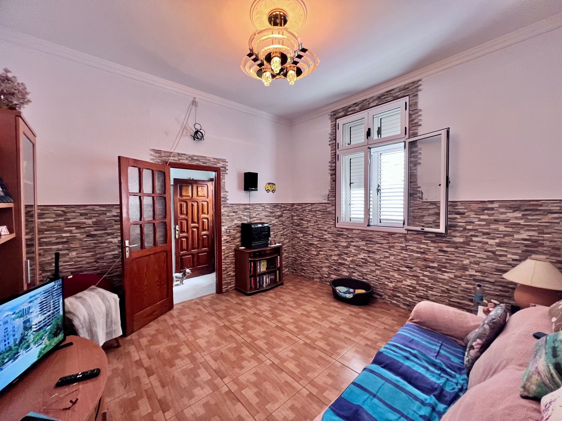 Sala d'estar de Casa adosada en venda en Las Palmas de Gran Canaria amb Moblat