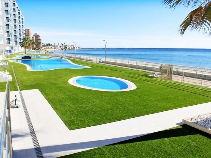 Swimming pool of Duplex for sale in La Manga del Mar Menor  with Air Conditioner, Heating and Terrace