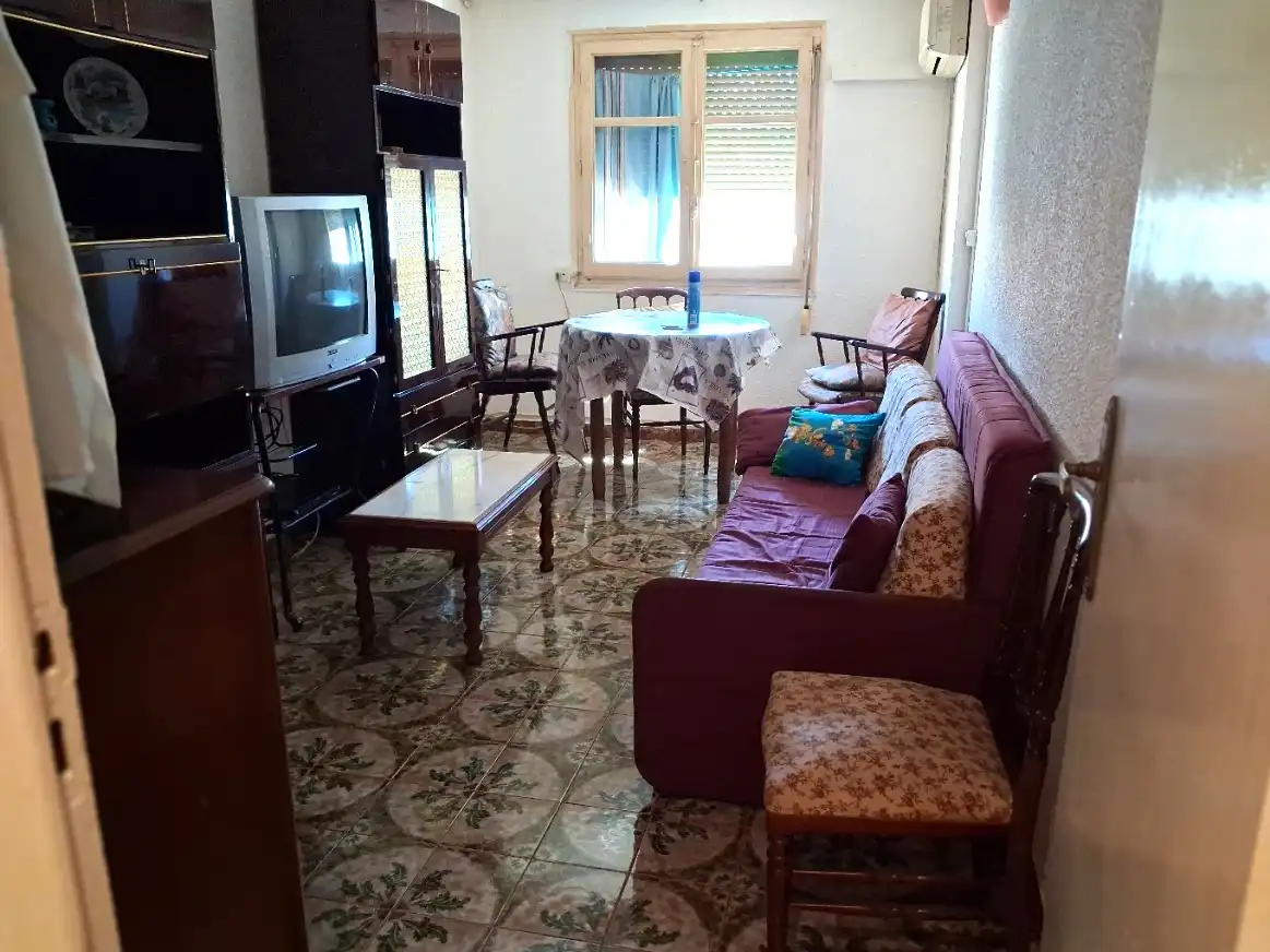 Living room of Flat for sale in Zaragoza  with Heating, Terrace and Furnished