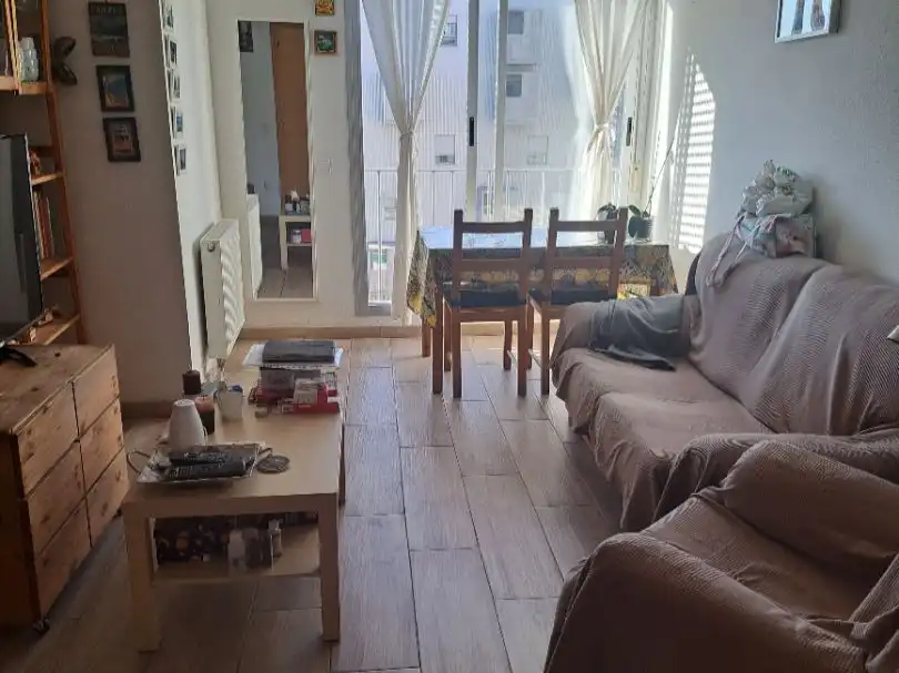 Sala de estar de Piso en venta en  Madrid Capital con Aire acondicionado y Balcón