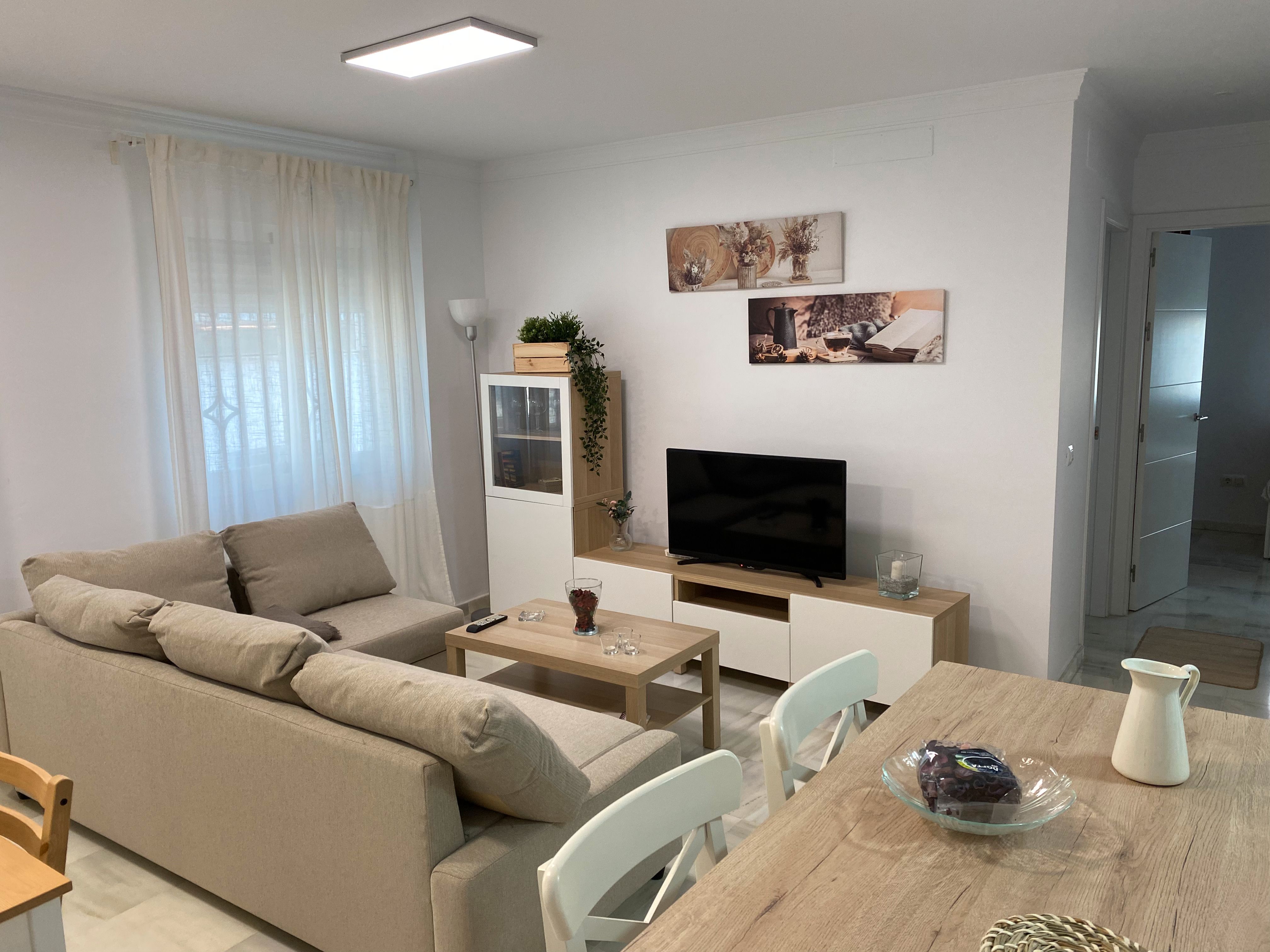 Sala d'estar de Pis de lloguer en Barbate amb Aire condicionat, Moblat i Forn