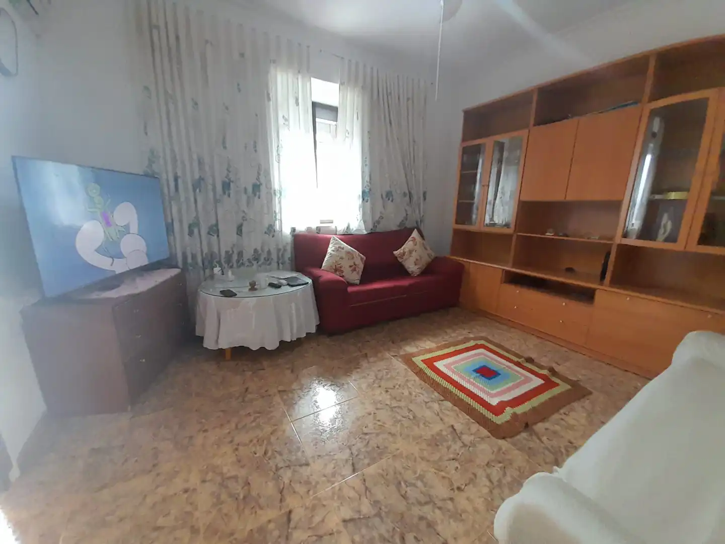 Sala d'estar de Casa adosada en venda en Puertollano amb Aire condicionat i Traster