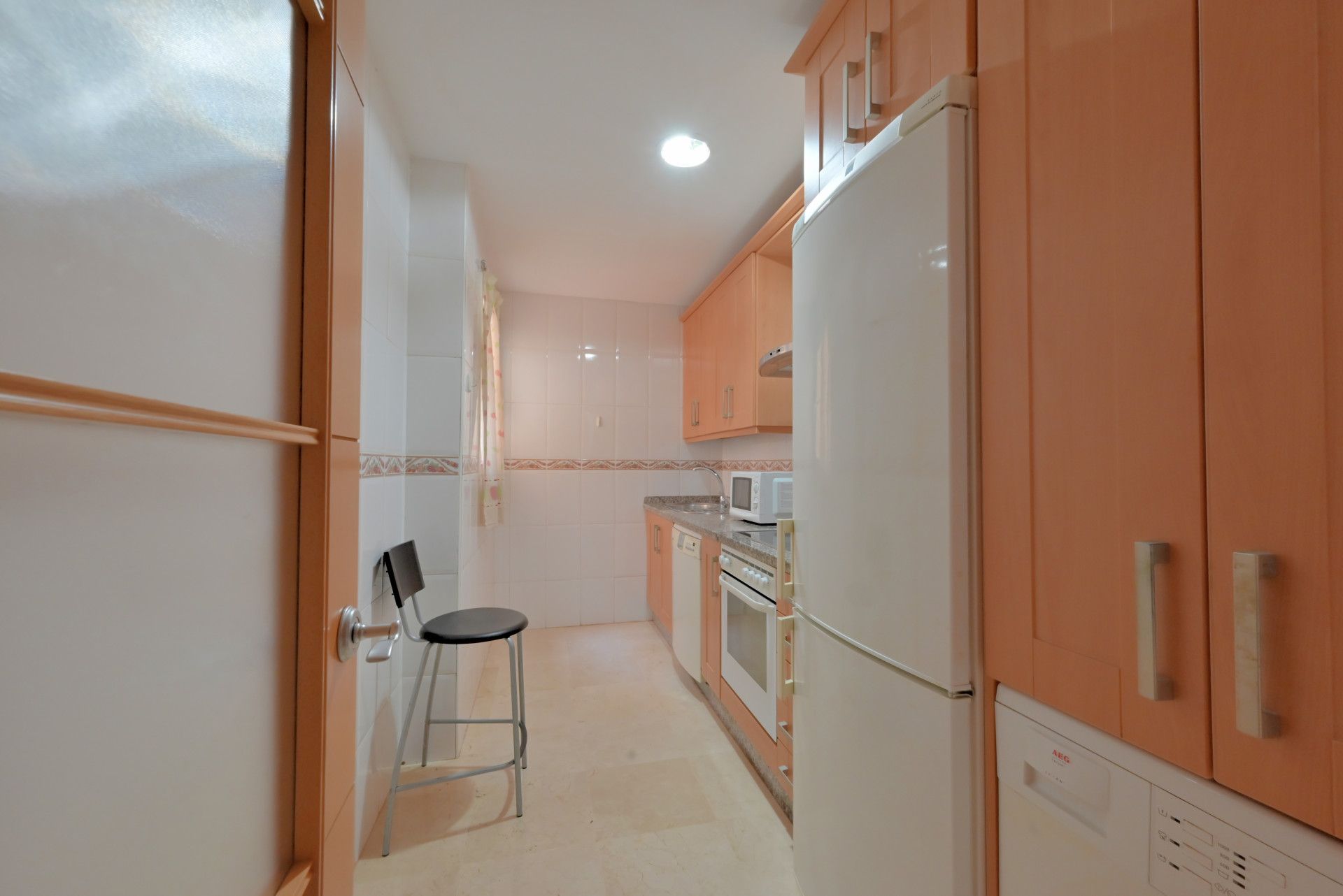 Cuina de Apartament en venda en Benalmádena amb Aire condicionat, Terrassa i Piscina