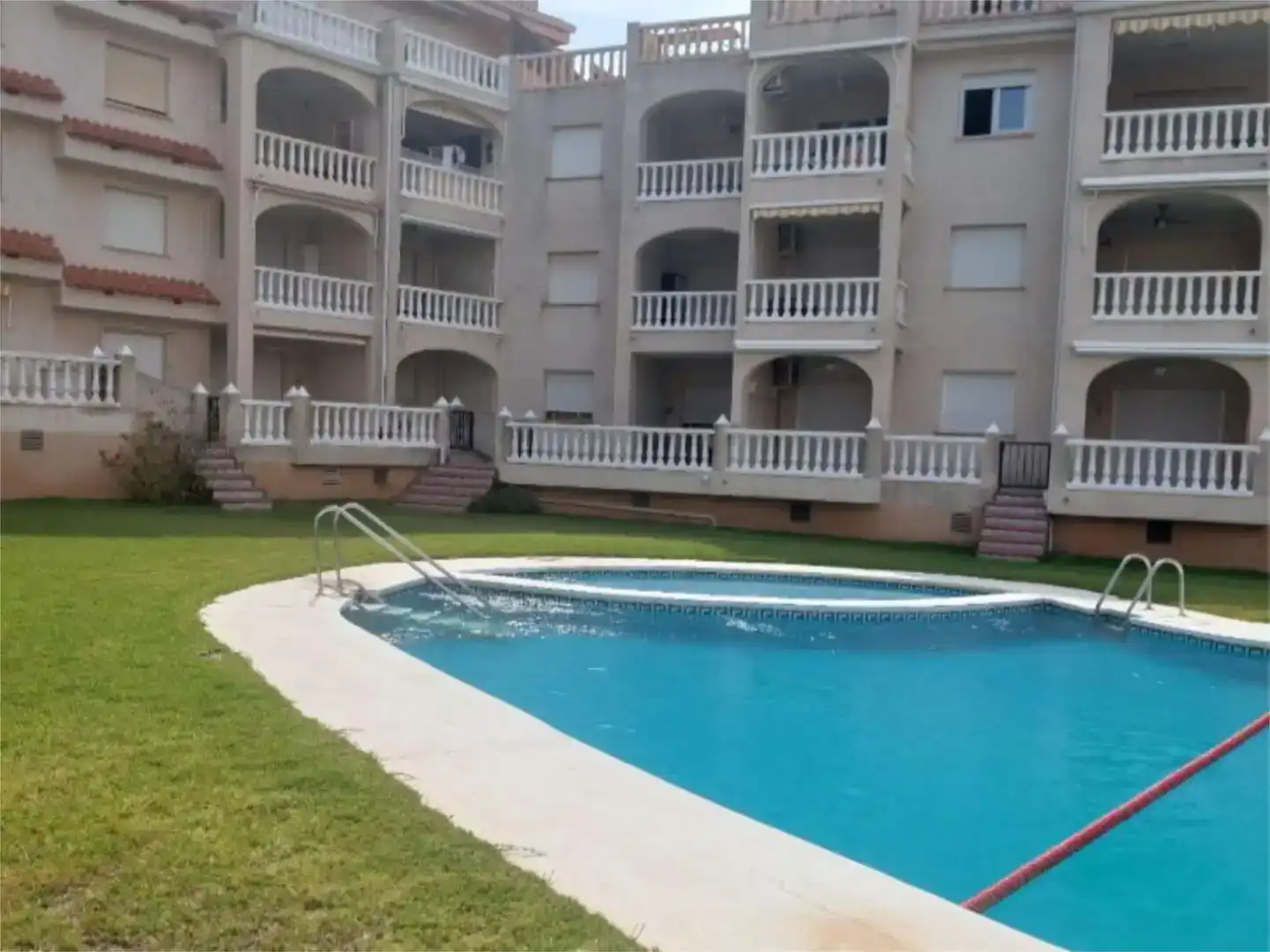Piscina de Pis de lloguer en Alcalà de Xivert amb Aire condicionat, Jardí privat i Piscina