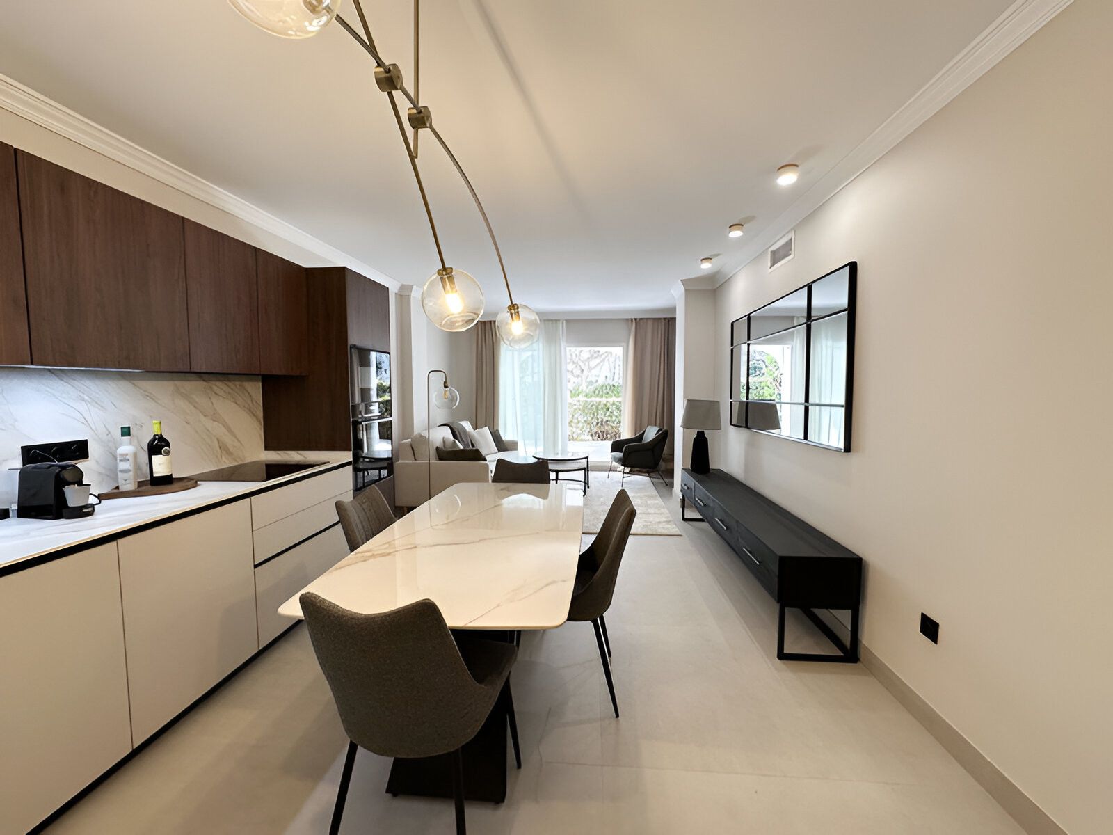 Living room of Planta baja for sale in Marbella  with Air Conditioner, Terrace and Swimming Pool