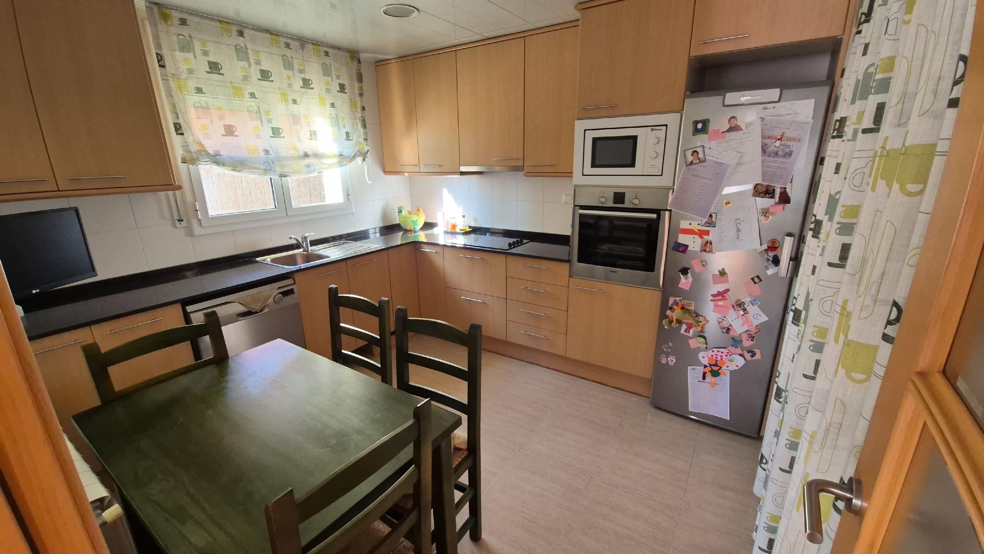 Cuina de Casa adosada en venda en Piera amb Calefacció, Jardí privat i Parquet