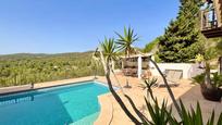 Exterior view of House or chalet for sale in Santa Eulària des Riu  with Air Conditioner, Terrace and Swimming Pool