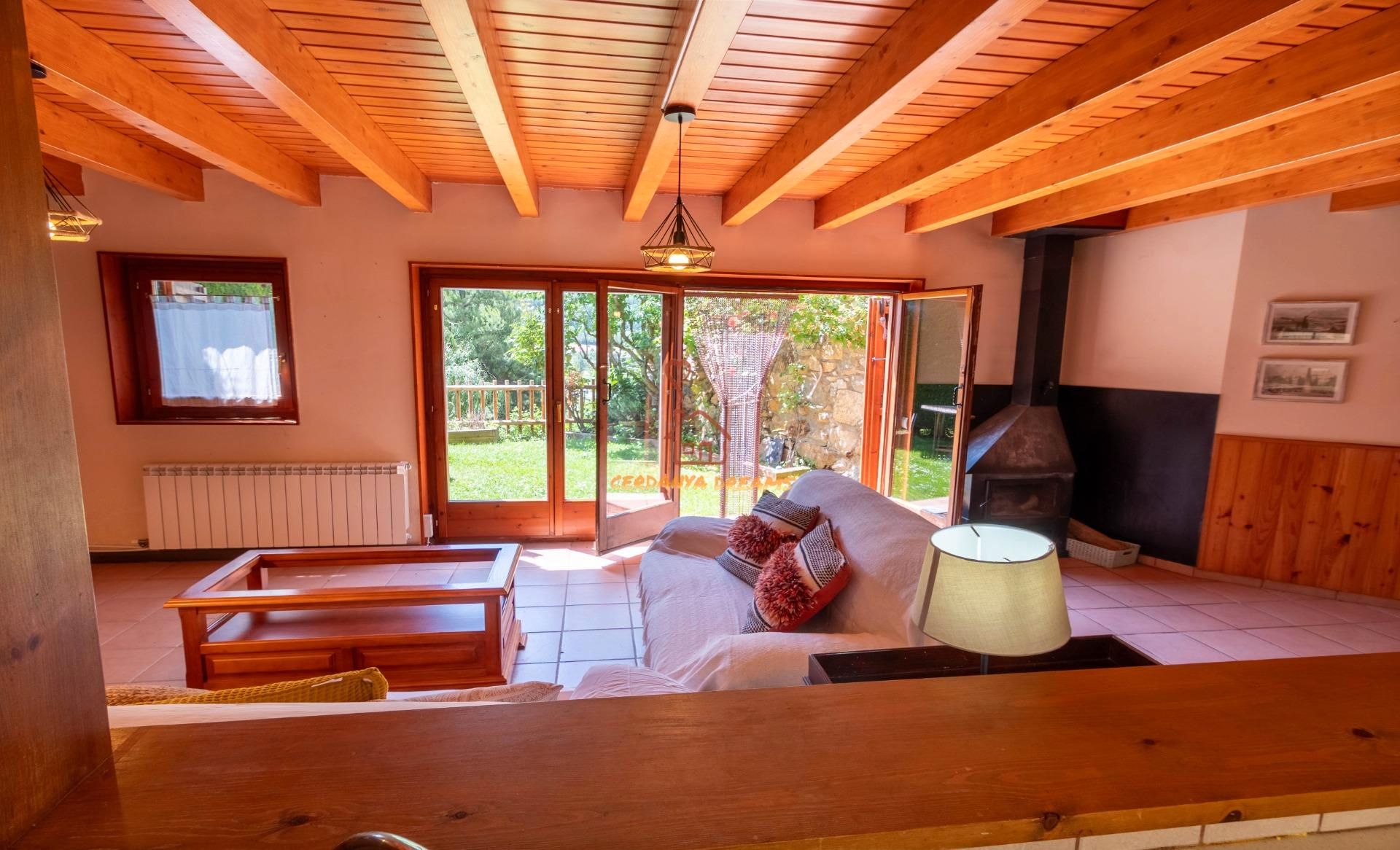 Sala d'estar de Casa adosada en venda en Montellà i Martinet amb Calefacció, Jardí privat i Parquet