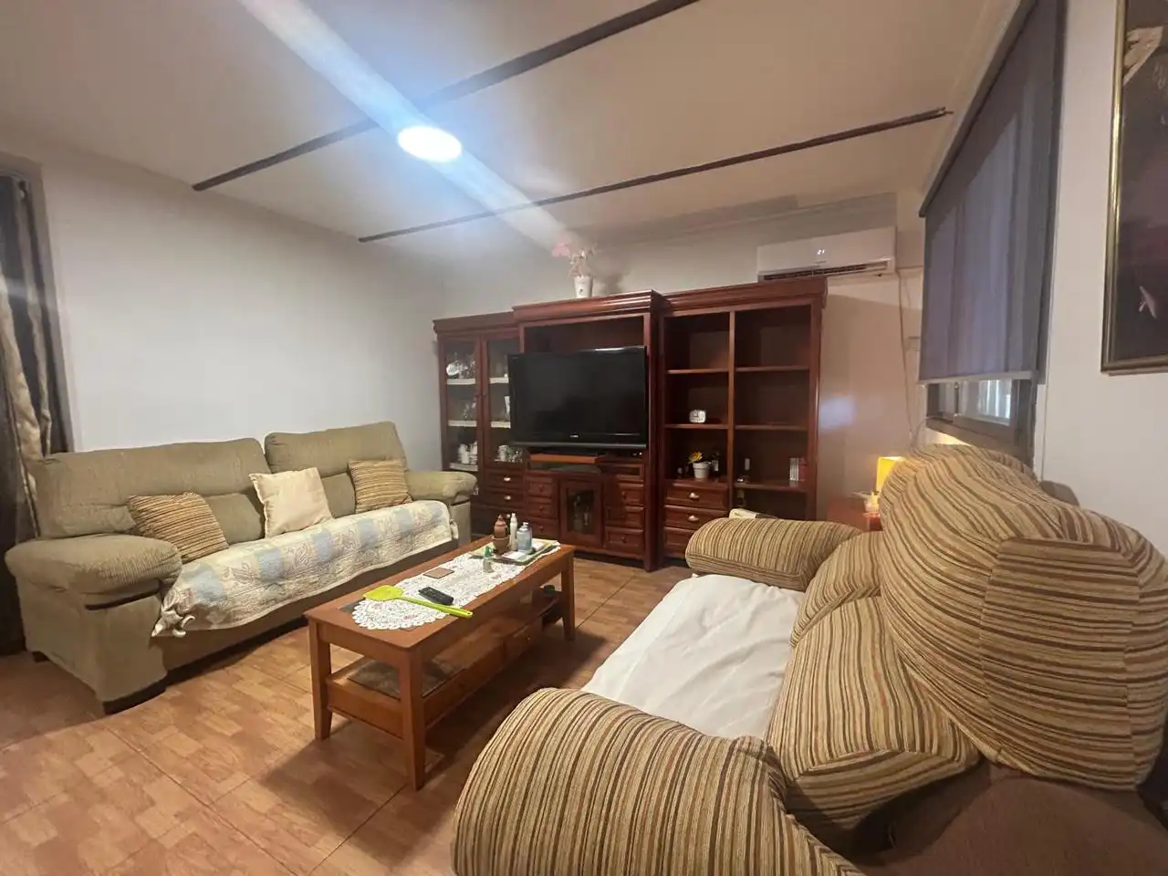 Sala de estar de Casa o chalet en venta en Dos Hermanas con Aire acondicionado, Calefacción y Jardín privado