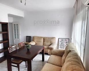 Living room of Flat for sale in  Sevilla Capital  with Air Conditioner, Heating and Parquet flooring