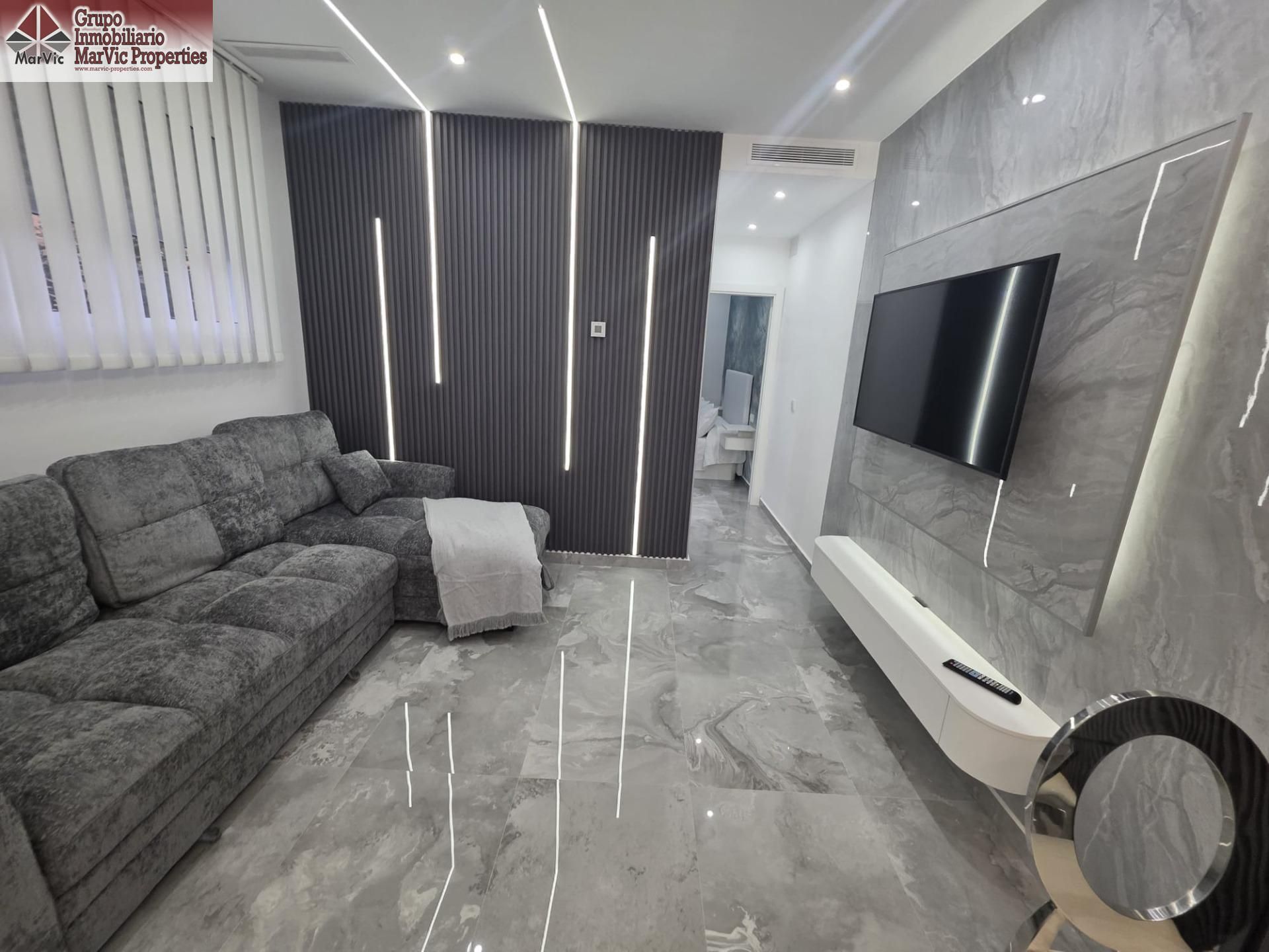 Sala de estar de Planta baja en venta en Benidorm con Piscina comunitaria