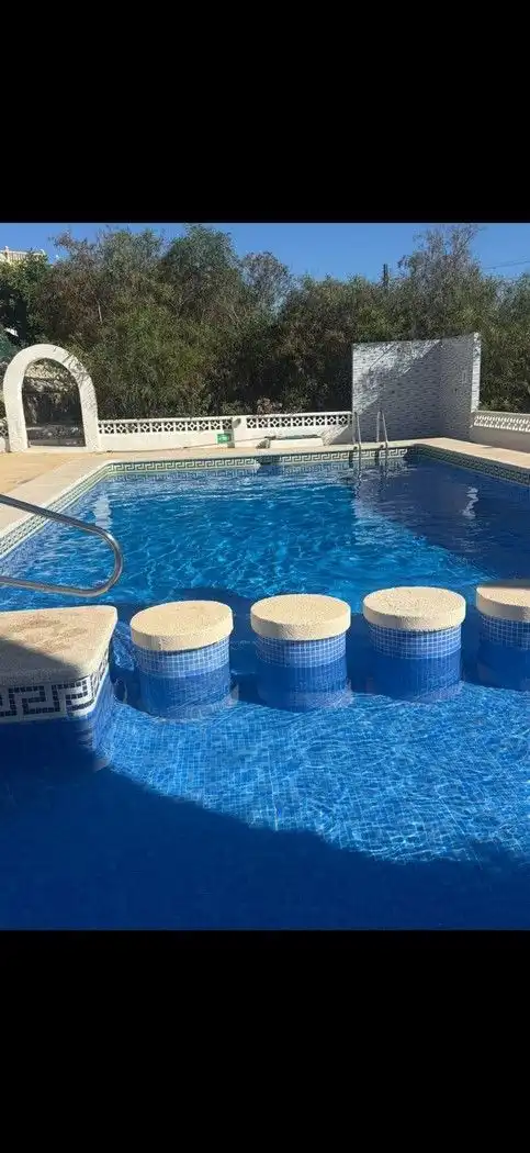Piscina de Casa adosada en venda en El Campello amb Aire condicionat, Calefacció i Terrassa