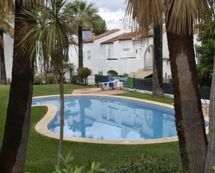 Swimming pool of Single-family semi-detached for sale in Estepona  with Air Conditioner, Terrace and Storage room