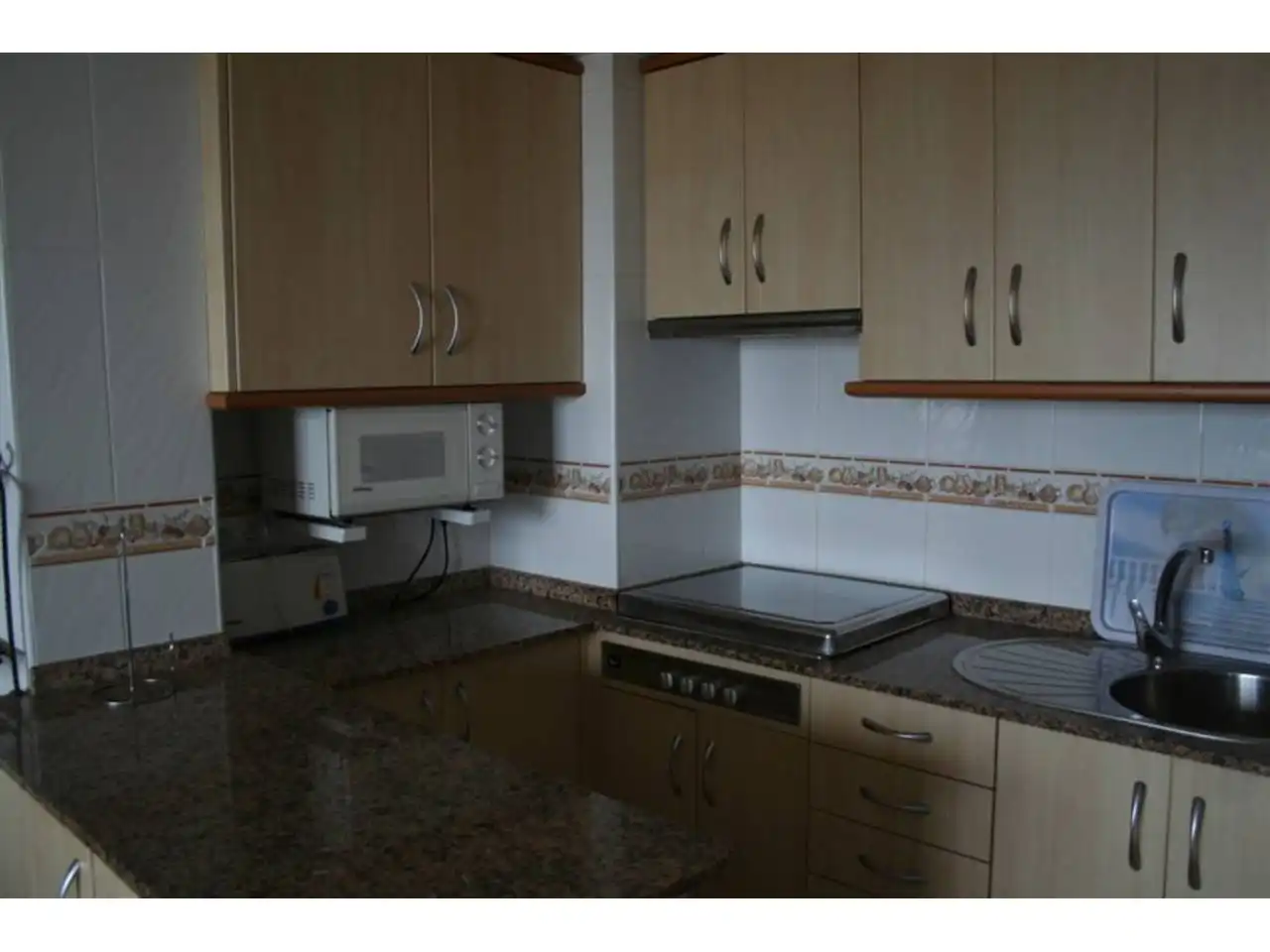 Cuina de Apartament en venda en La Manga del Mar Menor amb Aire condicionat, Terrassa i Moblat