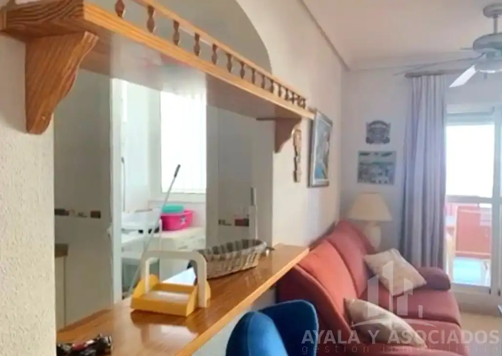 Sala de estar de Piso en venta en La Manga del Mar Menor con Terraza, Trastero y Piscina comunitaria