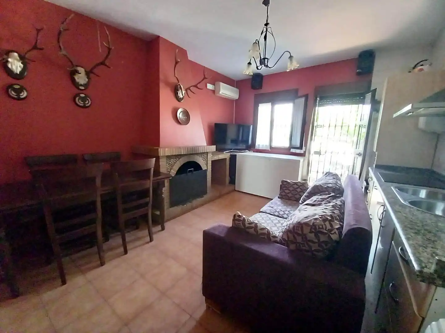Living room of Houses for sale in El Pedroso  with Air Conditioner, Terrace and Storage room