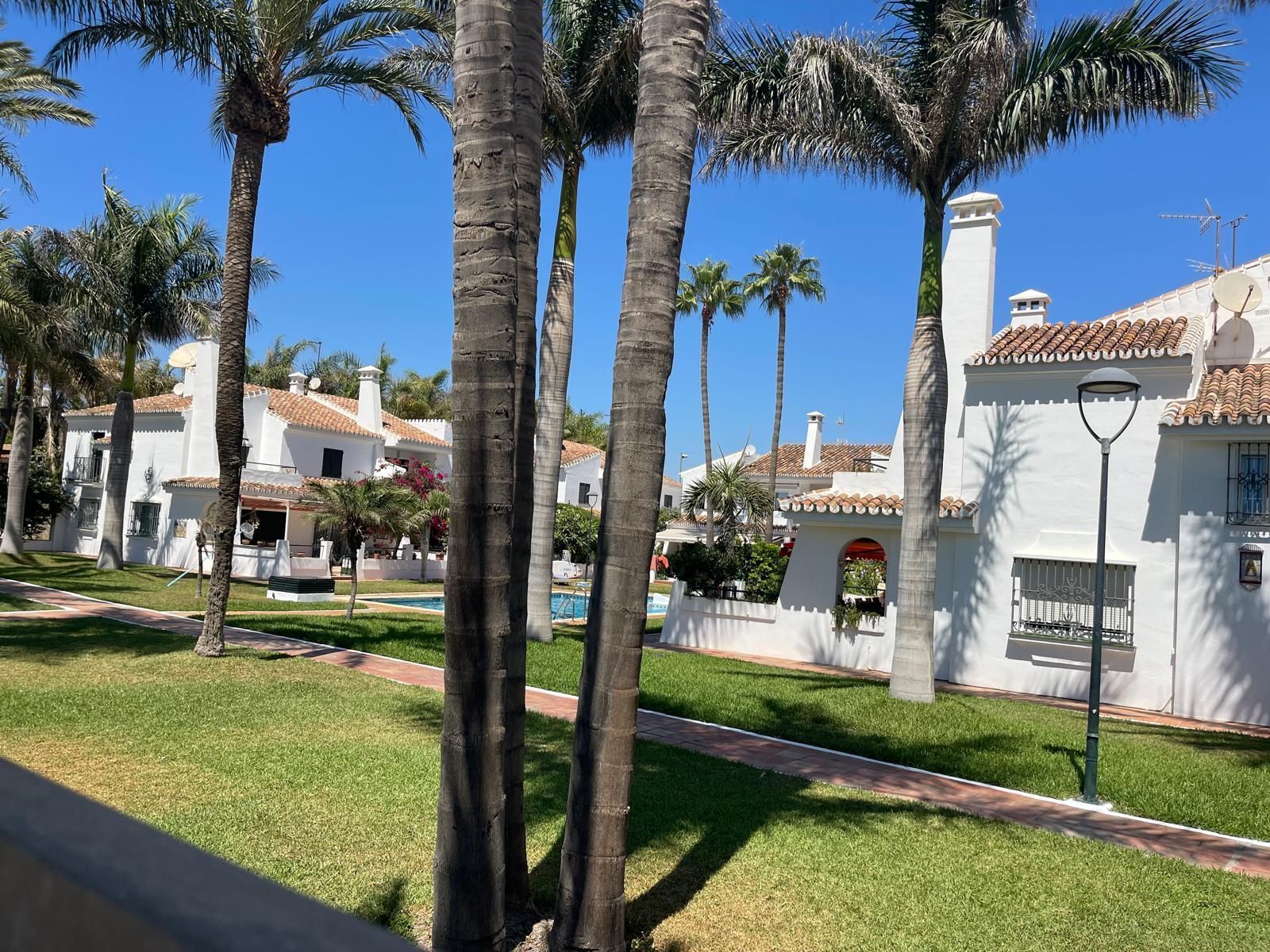 Exterior view of Single-family semi-detached for sale in Vélez-Málaga  with Furnished and Community pool