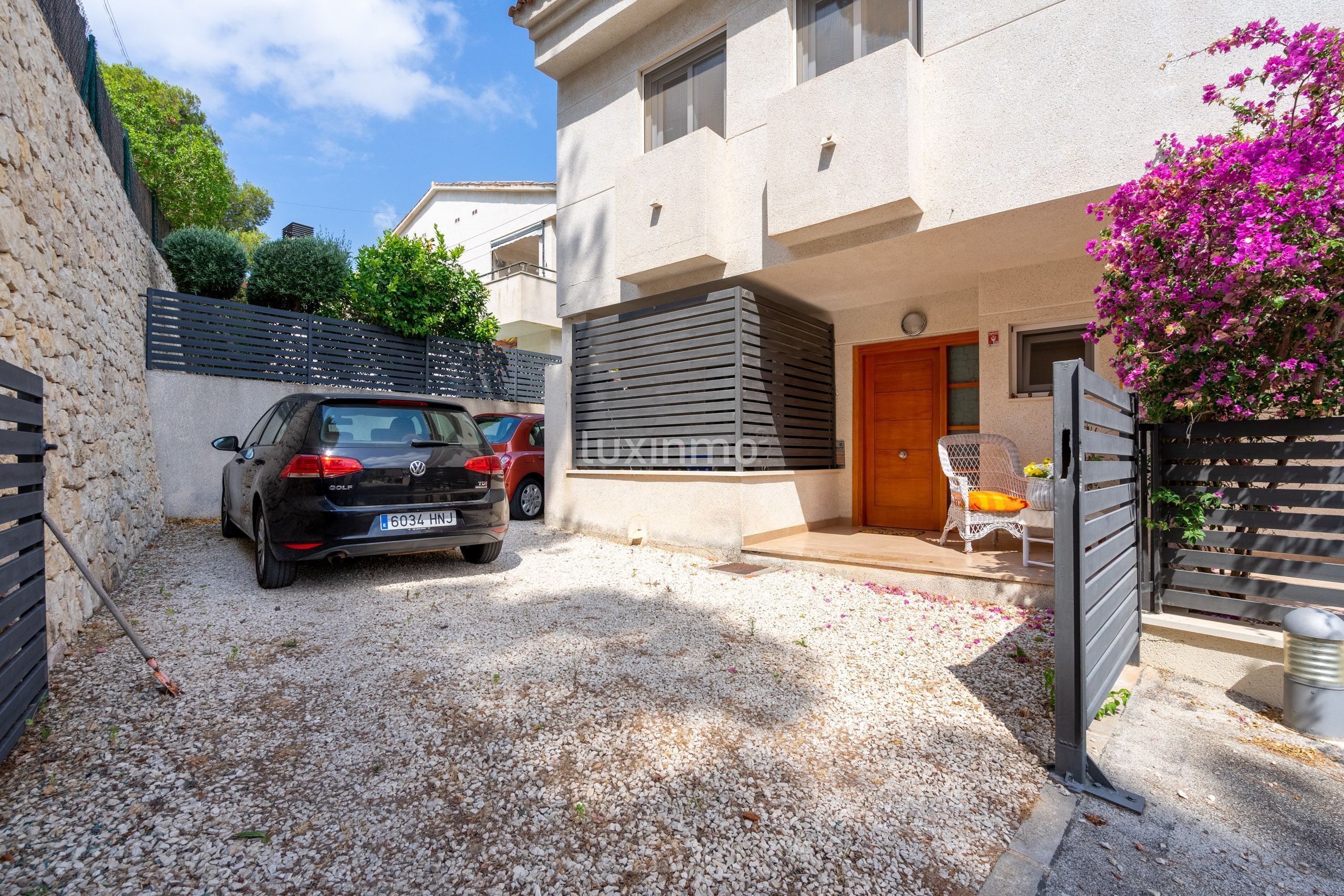 Vista exterior de Casa adosada en venda en Moraira amb Aire condicionat, Jardí privat i Terrassa