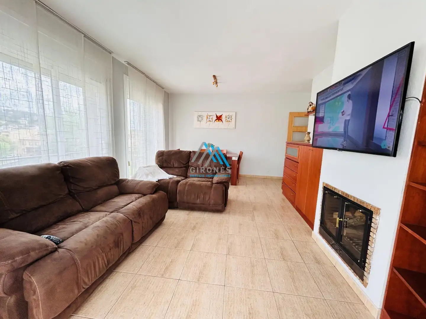 Sala de estar de Piso en venta en Santa Cristina d'Aro con Calefacción, Trastero y Amueblado
