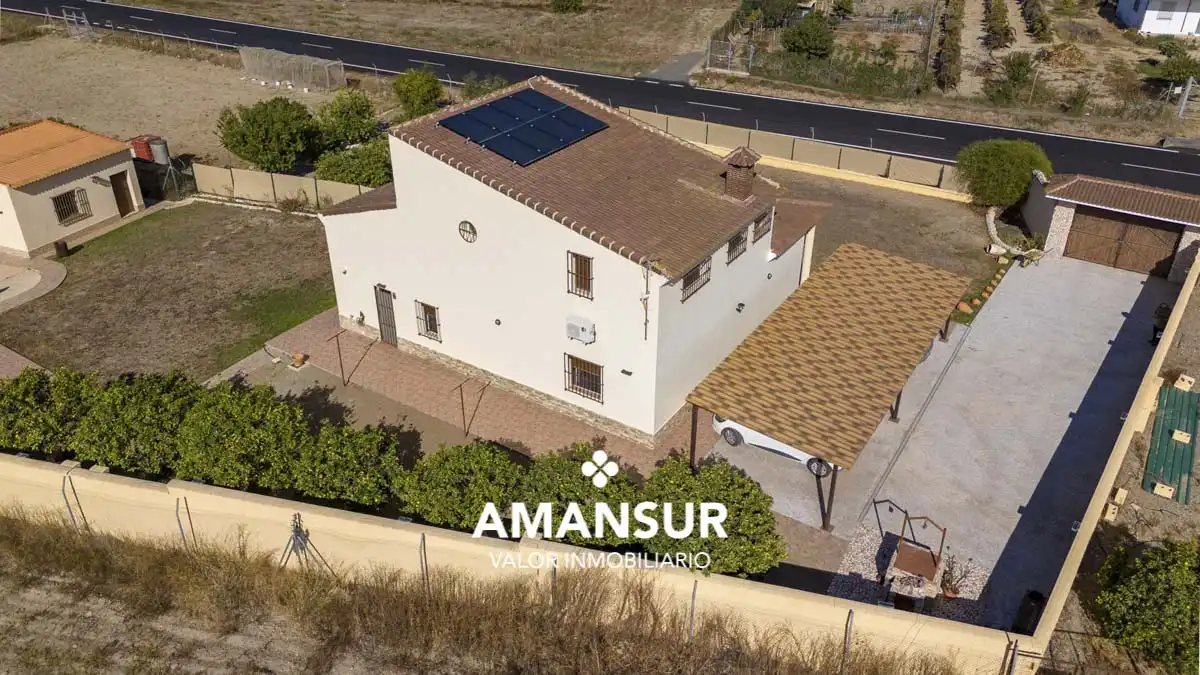 Vista exterior de Casa o xalet en venda en Villarrasa amb Aire condicionat, Calefacció i Jardí privat