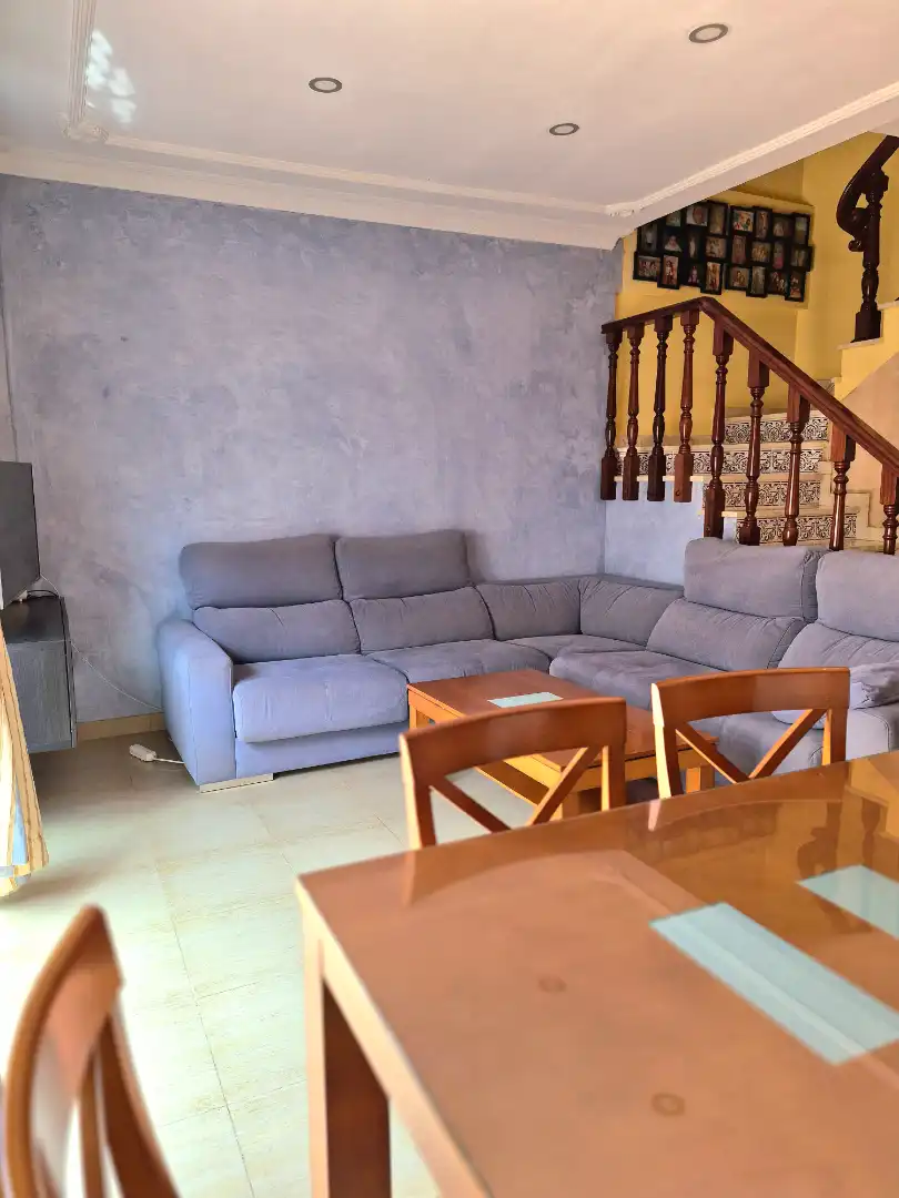 Sala d'estar de Casa o xalet en venda en Alcalá de Guadaira amb Aire condicionat