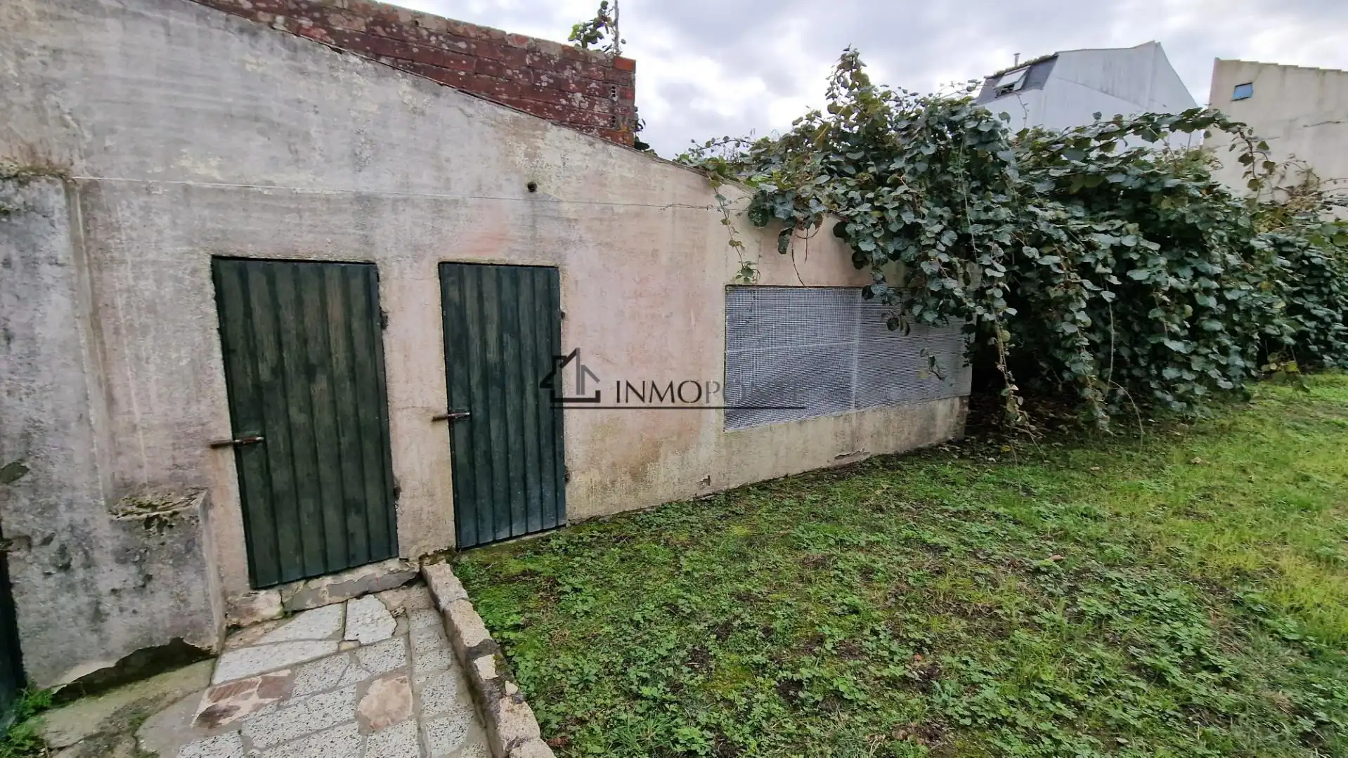 Casa adosada en venda en O Grove   amb Calefacció, Jardí privat i Traster