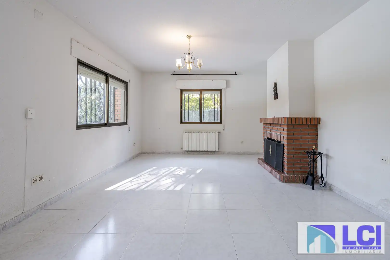 Sala de estar de Casa o chalet en venta en Villalbilla con Calefacción, Jardín privado y Terraza