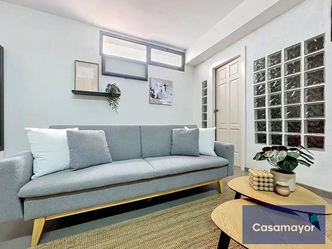 Sala d'estar de Casa o xalet en venda en Alicante / Alacant amb Aire condicionat, Calefacció i Jardí privat