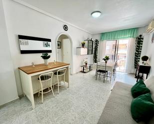 Dining room of Flat for sale in Torrevieja  with Air Conditioner, Terrace and Furnished
