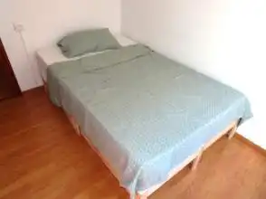 Schlafzimmer von Wohnung zur Miete in Gijón  mit Heizung, Parkett und Möbliert