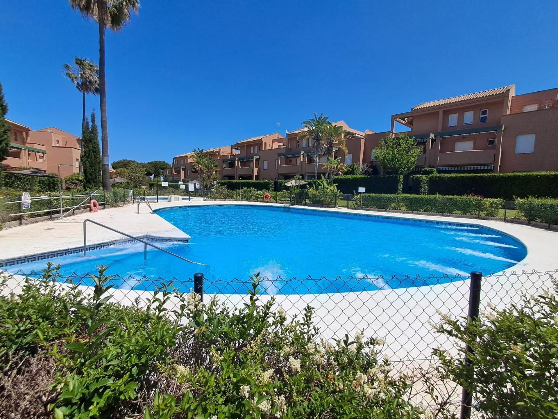 Swimming pool of Apartment for sale in Chiclana de la Frontera  with Air Conditioner, Heating and Private garden