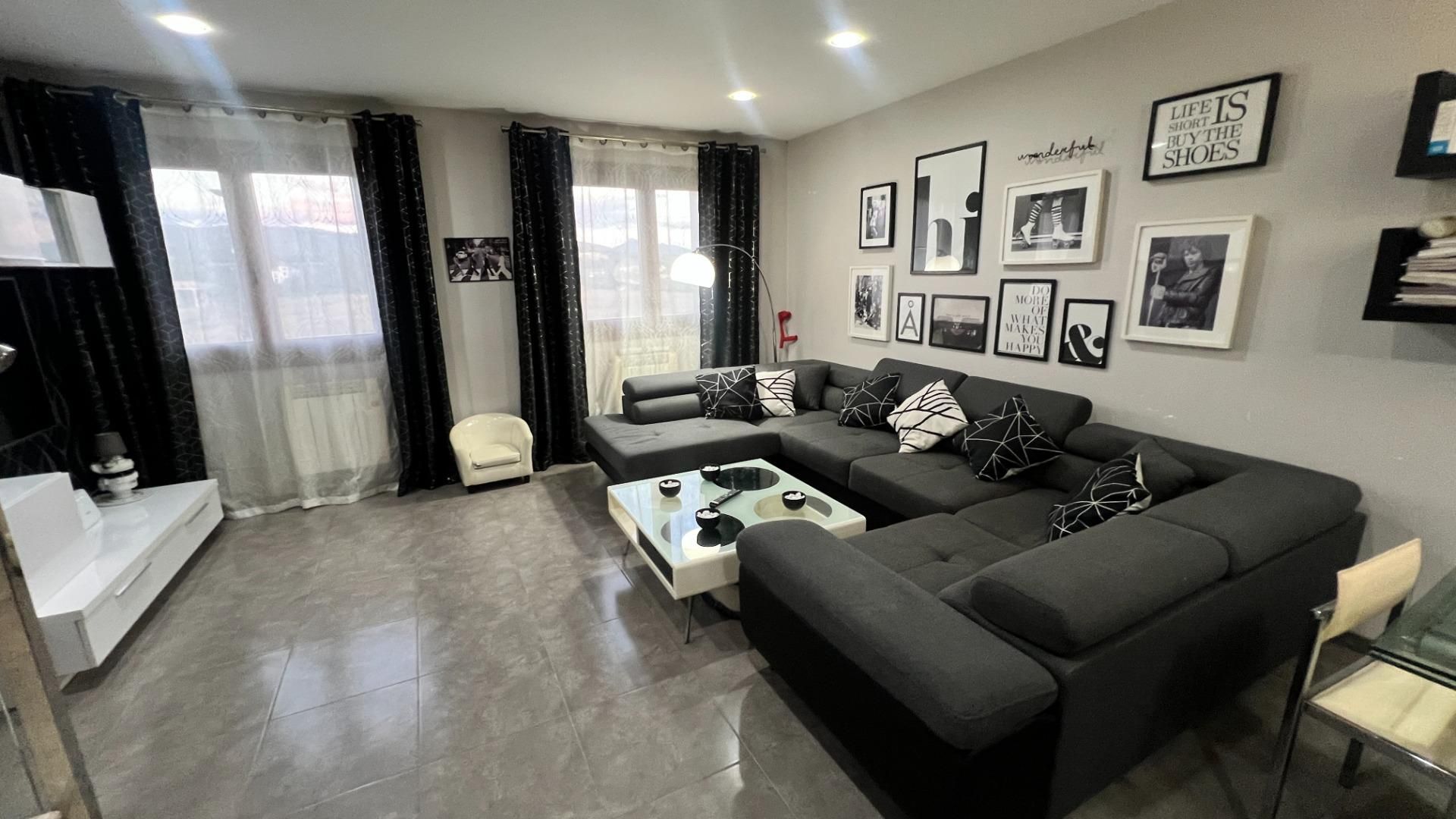 Sala d'estar de Casa adosada en venda en Castellón de la Plana / Castelló de la Plana amb Aire condicionat, Calefacció i Terrassa
