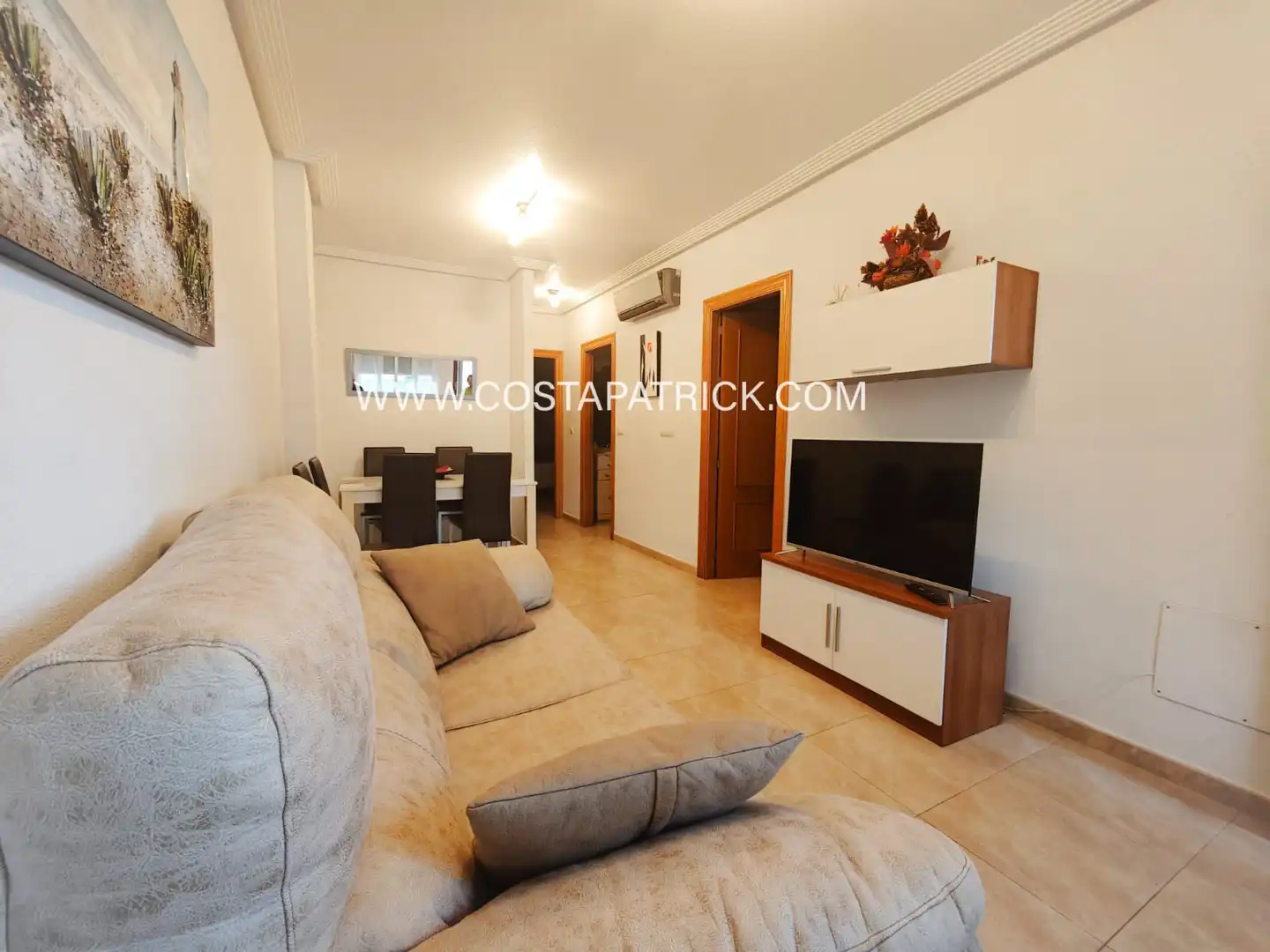 Sala d'estar de Casa adosada en venda en Los Alcázares amb Aire condicionat, Calefacció i Moblat