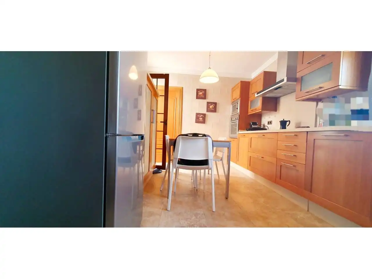 Cocina de Casa adosada en venta en Roquetas de Mar con Aire acondicionado, Calefacción y Jardín privado