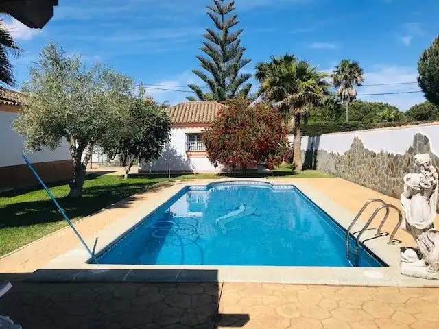 Piscina de Casa o xalet de lloguer en Chiclana de la Frontera amb Calefacció, Jardí privat i Terrassa