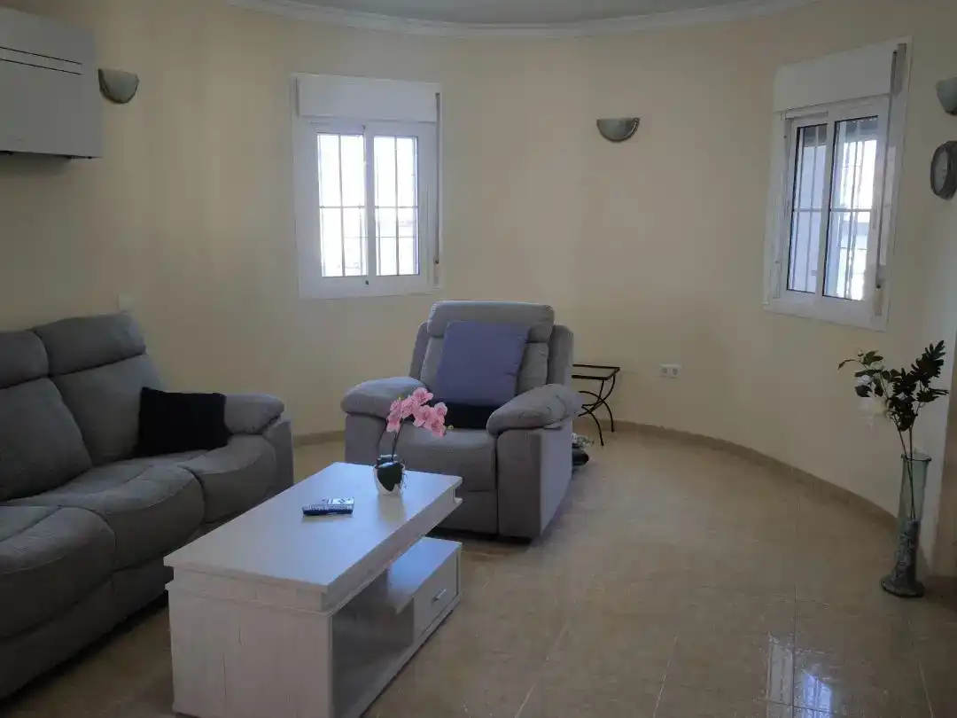 Living room of Flat for sale in Vélez-Málaga  with Air Conditioner, Private garden and Storage room