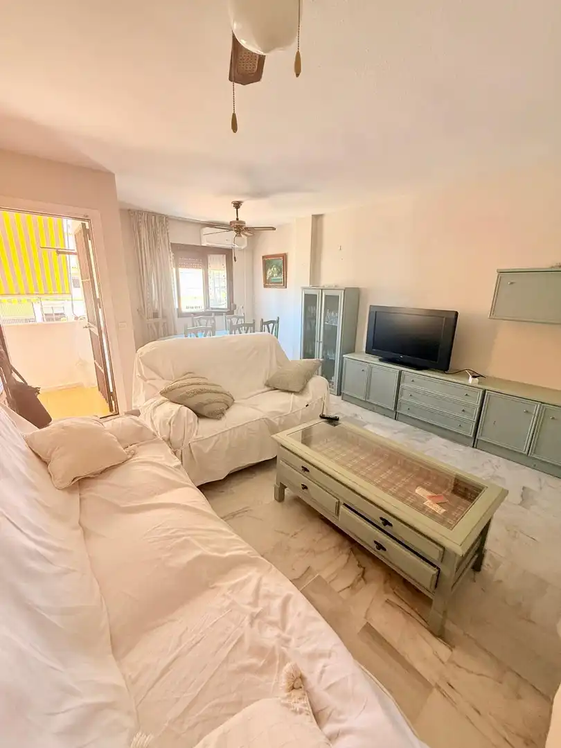 Sala d'estar de Apartament de lloguer en Vélez-Málaga amb Piscina comunitària