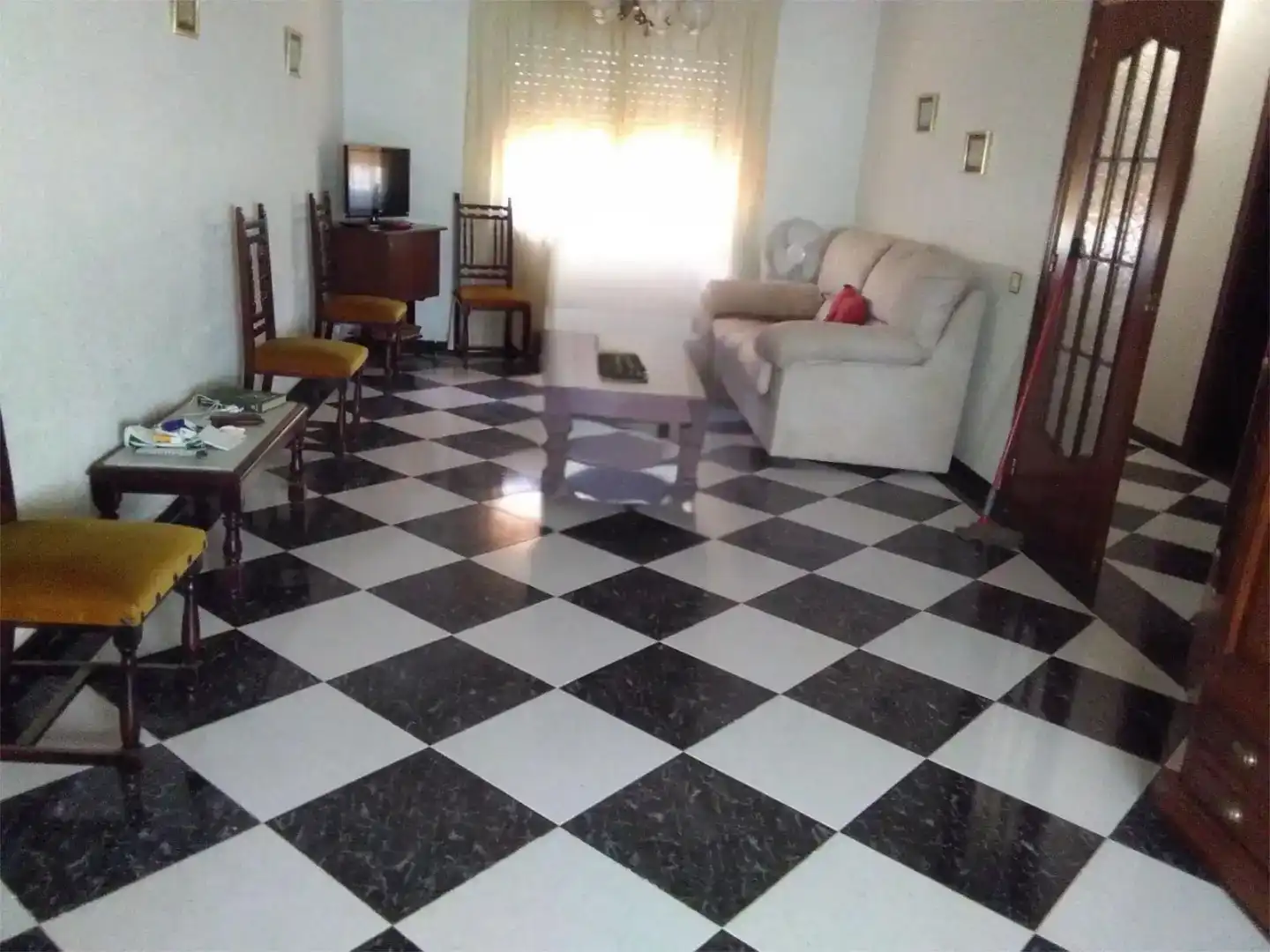 Sala d'estar de Casa adosada en venda en Baeza