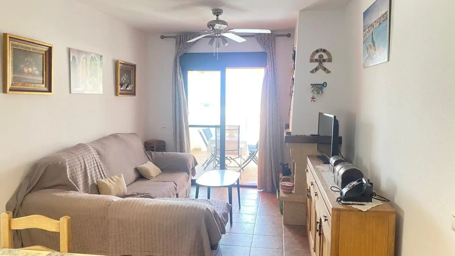 Sala d'estar de Apartament en venda en Alcolea amb Aire condicionat, Jardí privat i Traster