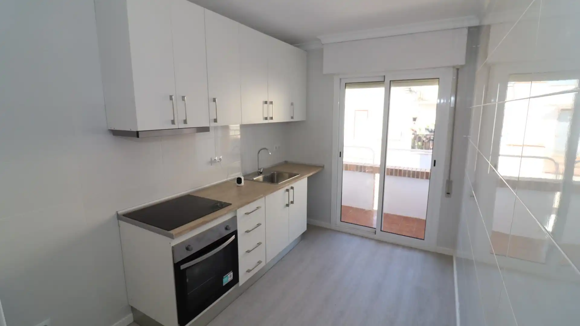 Kitchen of Flat for sale in Alcanar  with Parquet flooring and Terrace