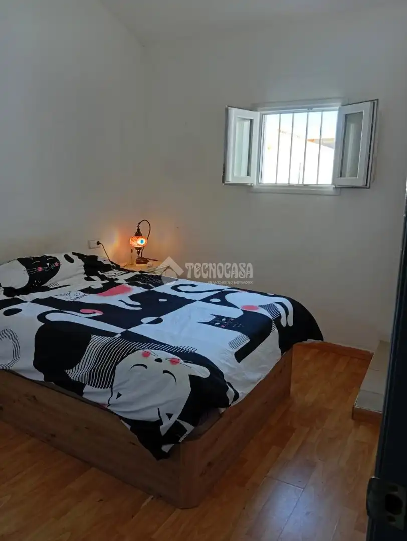 Habitación de Casa adosada en venta en Pilas con Aire acondicionado y Amueblado