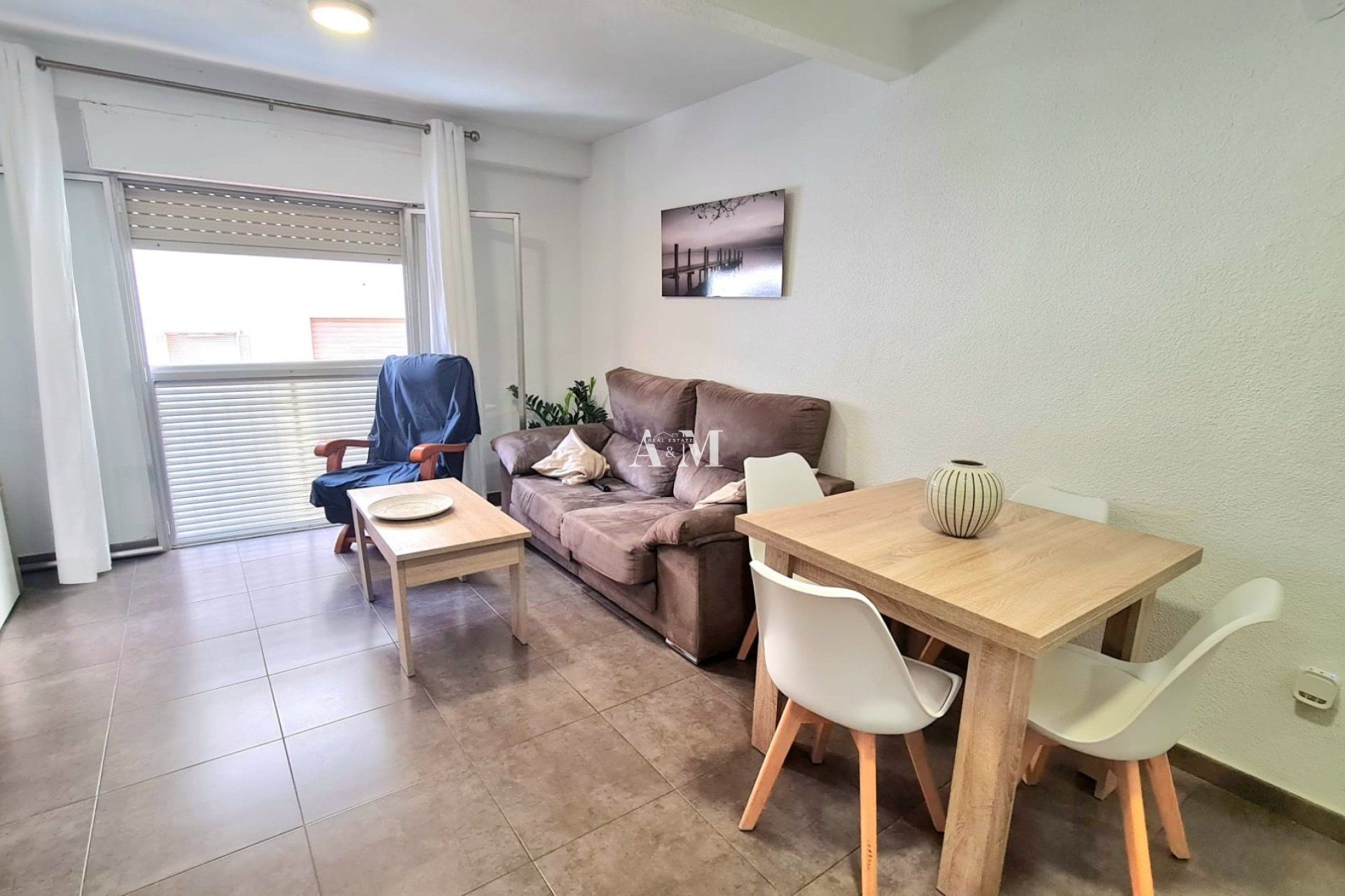 Sala d'estar de Apartament de lloguer en Santa Pola amb Calefacció, Moblat i Rentadora
